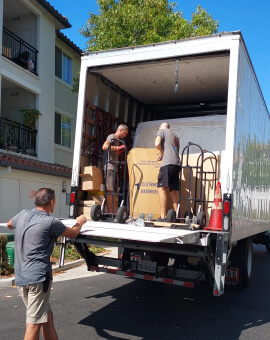 unpacking the stuff from a movers truck